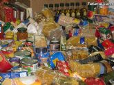 Cáritas y Adipsai reciben más de 700 kilos de comida y 200 litros de leche, aceite y zumos - 10