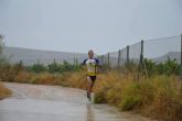 Atletas totaneros corren bajo la lluvia en Mula - 2