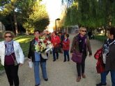 Mujeres de la Asociación de Amas de Casa de las Tres Ave Marías realizan una caminata popular y homenaje a las víctimas de la violencia de género - 6