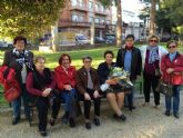 Mujeres de la Asociación de Amas de Casa de las Tres Ave Marías realizan una caminata popular y homenaje a las víctimas de la violencia de género - 7