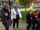 Mujeres de la Asociación de Amas de Casa de las Tres Ave Marías realizan una caminata popular y homenaje a las víctimas de la violencia de género - 11
