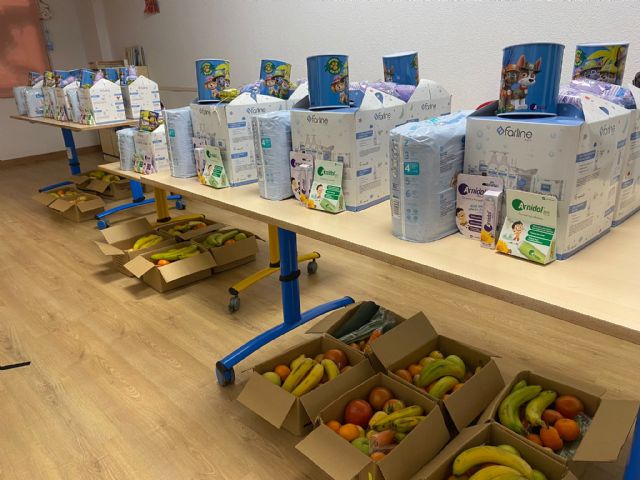 45 familias recogen la cesta solidaria de Arnidol en la casita de mensajeros - 1, Foto 1