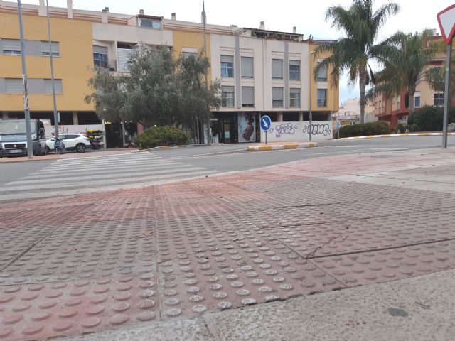 Construction work on a pedestrian ford in Santomera street, corner with Pliego street