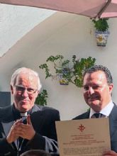 Nombramiento como Caballero de la Orden de San Fernando el ex-hermano mayor de la Hermandad de la Vera-cruz de Alcalá del Río
