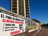 El Frente Obrero despliega pancartas contra la subida del paro