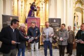Más de 125 músicos funden tradición y devoción en el histórico concierto 'Perdón y Sangre' que une a las cofradías lorquinas del Paso Morado y Paso Encarnado Más de 125 músicos funden tradición y devoción en el histórico concierto 'Perdón y Sangre' que une a las cofradías lorquinas del Paso Morado y Paso Encarnado
