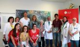 Un cuadro colectivo creado por enfermos de cncer, familiares, voluntarios y personal del Hospital Santa Luca como expresin de la lucha contra la enfermedad