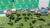 La Guardia Civil detiene a 30 personas pertenecientes a una organizacin criminal dedicada a la adquisicin y  venta de armas de fuego