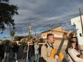 La Virgen de la Purísima del Esparragal recorre las calles de la pedanía acompañada por la Cuadrilla y cientos de vecinos