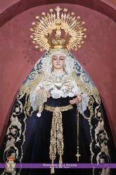 La Hermandad de la Soledad de Alcalá del Río honra a sus difuntos con el luto de su Titular y la Misa de Réquiem