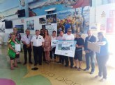 La ONCE presenta en la lonja de pescadores su cupn para promocionar el consumo de sardina