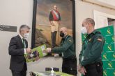 Grande-Marlaska presenta el calendario solidario 2021 de la Guardia Civil