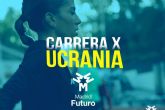 �Madrid Futuro x Ucrania'. La capital espanola se tine con la bandera de Ucrania en 5km de marcha por la paz