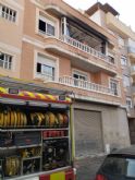 Incendio en el interior de una vivienda de tres alturas, en el casco urbano de Molina de Segura
