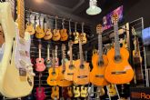 Musicopolix; Guitarras pequenas para grandes m�sicos