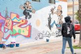 Cartagena homenajea a Ibanez con un grafiti en la fachada del Luzzy