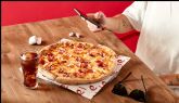 La marca l�der de pizza en Espana vuelve a romper las reglas lanzando la pizza mediana m�s grande de todas a un precio reducido