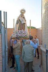 Traslado en andas la Virgen del Carmen desde la capilla del puente a la parroquia de Ntra. Sr. de la O