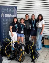 M�s de 80 mujeres participan en un bautismo de buceo promovido por Pol�tica Social con motivo del 8 de Marzo