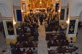 La banda y el coro de la asociación Amigos de la Música anuncian la Semana Santa con su tradicional concierto
