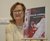 Hoy visita la caseta del Grupo Oretania y Lo Que Te Da La Gana, Bego&ntilde;a Mansilla, coordinadora de 'Velos de realidad' libro p�stumo del poeta Manuel Mu&ntilde;oz Moreno
