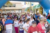 La I Marcha Solidaria de la Hispanidad a beneficio de Caritas lleno las calles de la Barriada Hispanoamerica