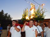 La virgen del Carmen procesiona por su barrio torreño con motivo de su festividad