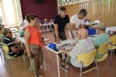 Los mayores del Centro de D�a aprenden jardiner�a