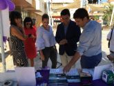 San Javier conmemor el Da Mundial del Alzheimer con la lectura de un manifiesto y un stand informativo en la plaza de España