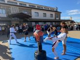 Deportistas del CAR acercan la lucha y el taekwondo a UCAM Cartagena