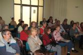 Personas mayores y con discapacidad asistieron a una conferencia sobre la restauracion de la Casa de la Fortuna y de la Casa Salvius