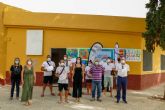 Los participantes del programa Barrios ADLE en la Barriada Virgen de la Caridad reciben sus diplomas