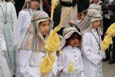 Cientos de pinatarenses acompañan la imagen de Jesús Triunfante en el Domingo de Ramos