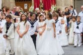 Una marea blanca procesiona en Cartagena en el da del Corpus Christi