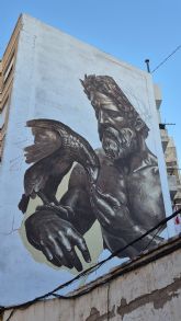 Cinco artistas urbanos pintan sus murales en las calles de Alcantarilla durante el festival de arte urbano Octubre Joven