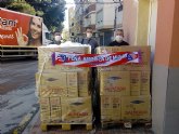 La Peña de Aficionados y Simpatizantes Muleños del Club Atltico de Madrid, ha realizado una donacin de mil litros de leja