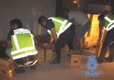 Seis detenidos y 107 kilos de marihuana incautada por la Polica Nacional en un polgono industrial de Lorqu