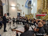La Orquesta Pulso, Púa y Pasión eleva los corazones nazarenos en un emotivo concierto de Domingo de Ramos