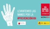 Lazos rojos y vales canjeables por un preservativo para conmemorar el Da del SIDA